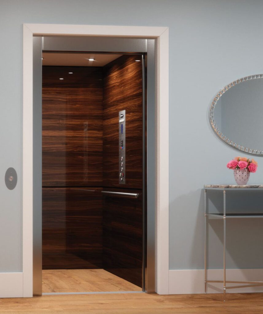 Savaria Eclipse Elevator Slim luxury package with walnut luxury MDF, stainless steel fixtures and automatic doors